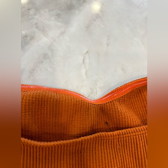 Crop tube top. Burnt orange/copper colour. Stick top so it does not fall. New. - Picture 2 of 3